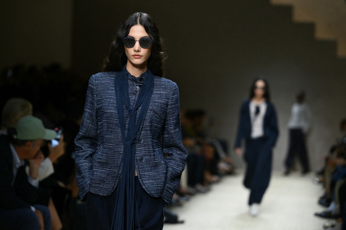 A model walks the runway during the Emporio Armani collection show at Milan's Fashion Week Womenswear Spring / Summer 2026, on September 25, 2025 in Milan. (Photo by Marco Bertorello / AFP)
