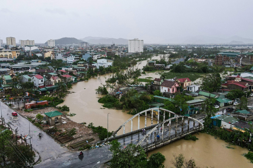 An aerial photo shows a general view after typhoon Bualoi's passage in Nghe An province on September 29, 2025. (Photo by Thai An / AFP)