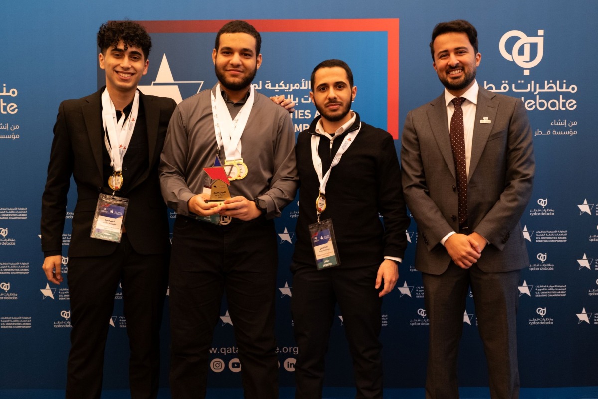 A group of winners of the debating contest. 