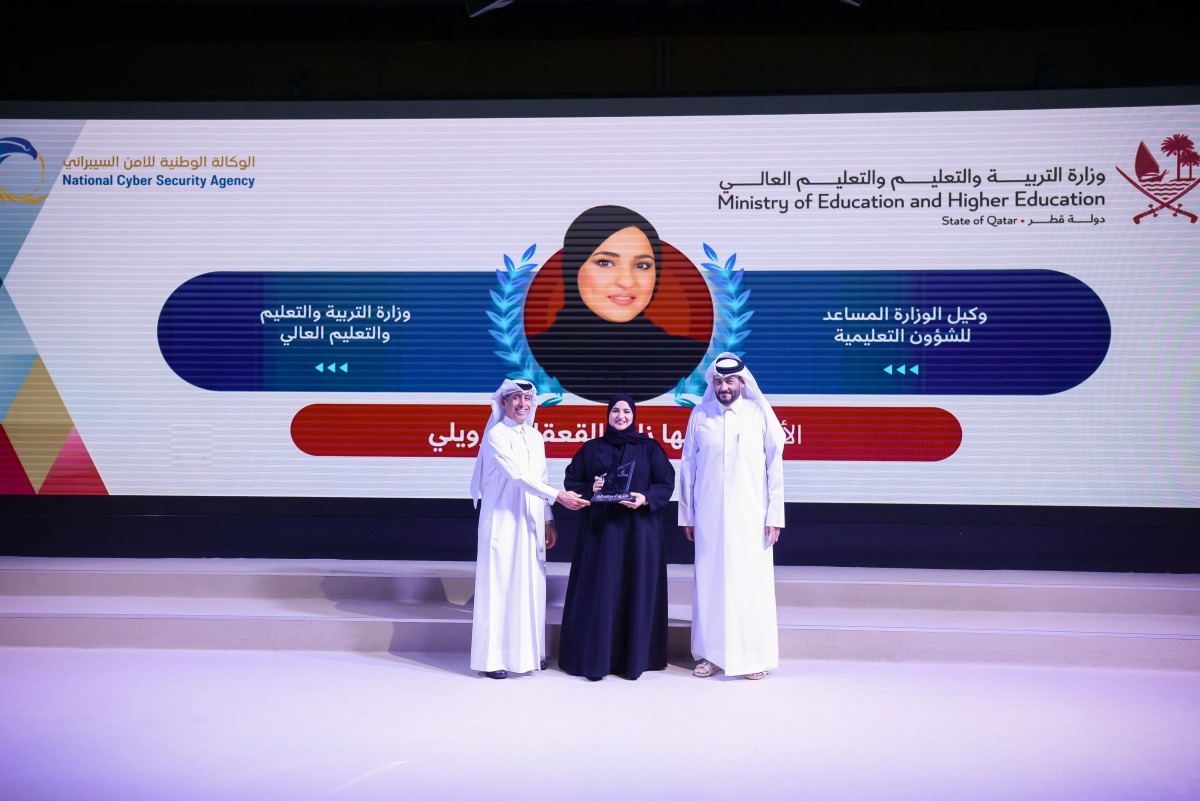 MoEHE Undersecretary H E Dr. Ibrahim bin Saleh Al-Nuaimi and NCSA President H E Eng Abdulrahman Ali Muhammad Al Farahid Al Malki honouring Assistant Undersecretary for Educational Affairs Maha Zayed Qaqaa Al Ruwaili.
