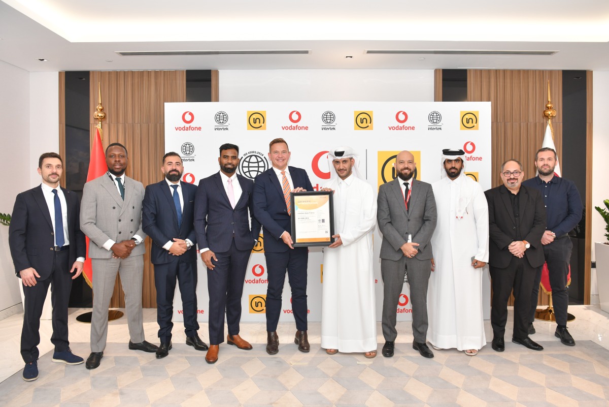 Vodafone Qatar and Intertek Global International officials at the award ceremony.