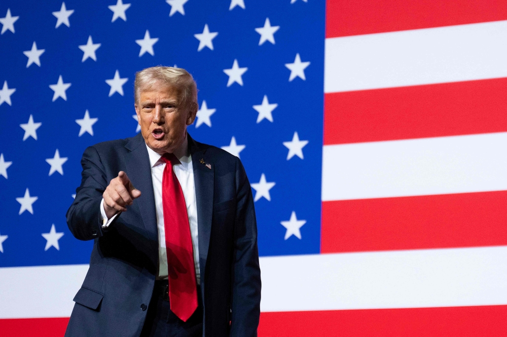 US President Donald Trump departs after addressing senior military officers gathered at Marine Corps Base Quantico in Quantico, Virginia, on September 30, 2025. (Photo by Jim Watson / AFP)
