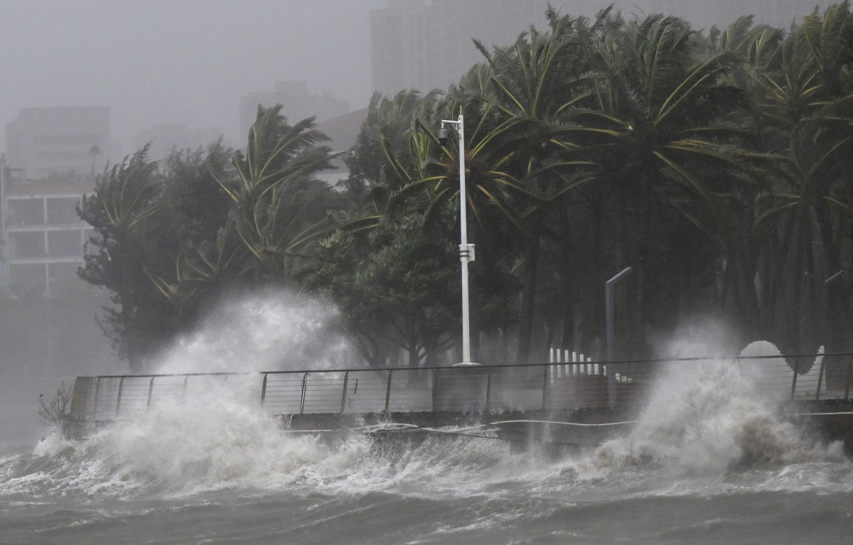 This photo taken on Oct. 5, 2025 shows high waves in a seashore area of Haikou, south China's Hainan Province. Xinhua/Guo Cheng