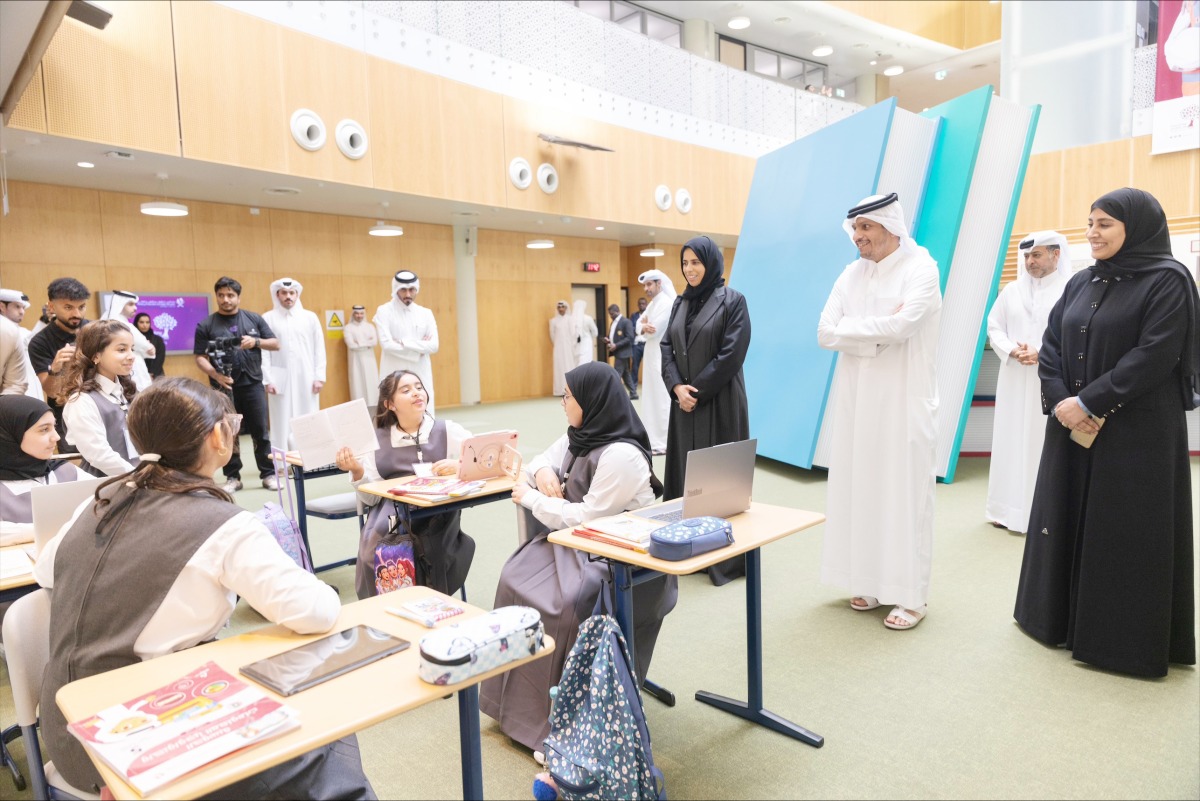 Prime Minister and Minister of Foreign Affairs H E Sheikh Mohammed bin Abdulrahman bin Jassim Al-Thani and Minister of Education and Higher Education H E Lolwah bint Rashid bin Mohammed Al Khater with other officials during an event to mark World Teachers’ Day at Ministry headquarters yesterday.