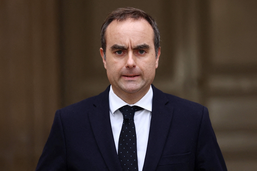 Outgoing French Prime Minister Sebastien Lecornu delivers a statement in Paris, on October 6, 2025. (Photo by Stephane Mahe / Pool / AFP)