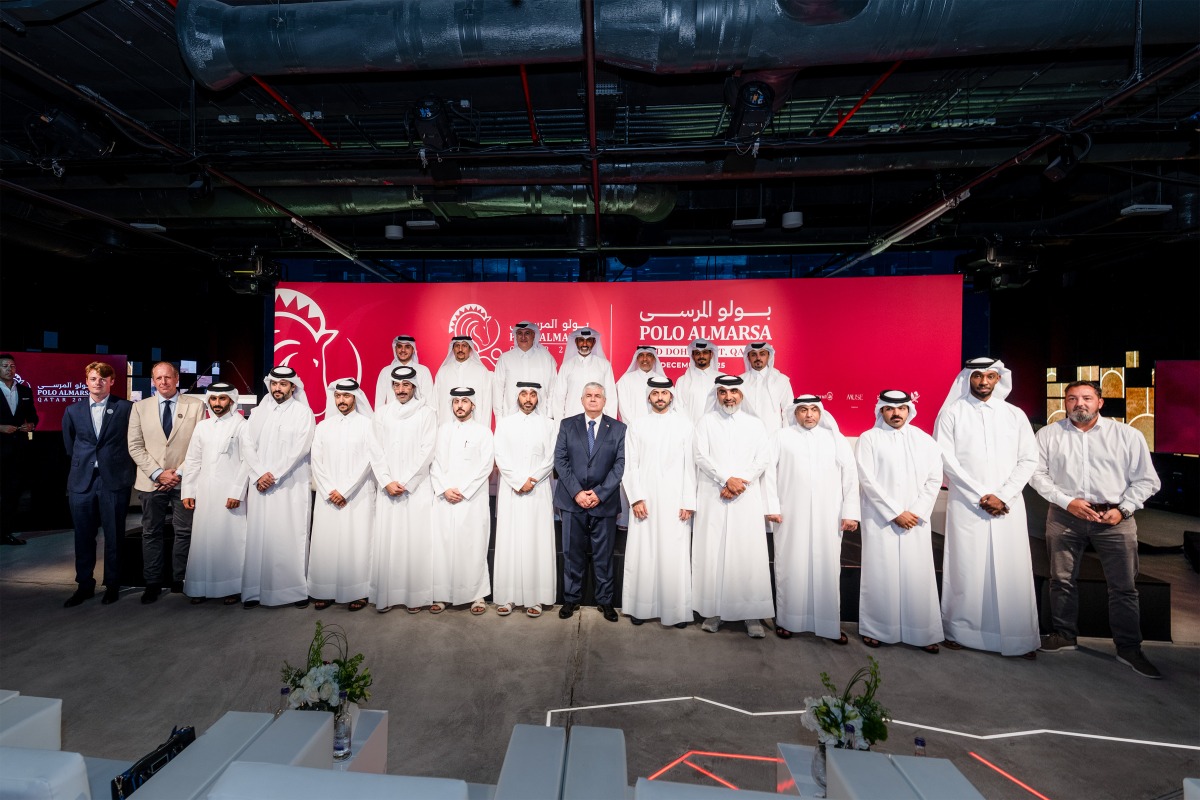 Officials pose for a photograph following a press conference held in connection with the launch of Polo AlMarsa Qatar, the country’s first ever polo showcase.