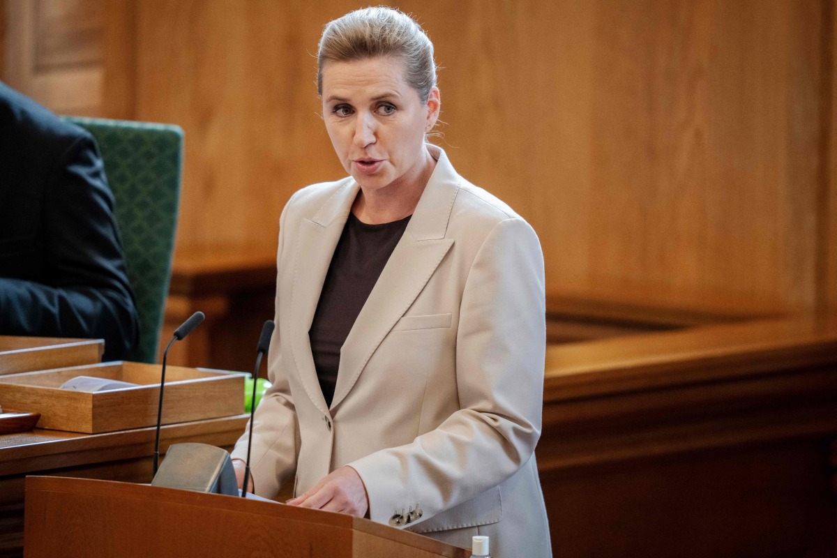 Denmark's Prime Minister Mette Frederiksen speaks during the opening of the Danish Parliament at Christiansborg Palace in Copenhagen, on October 7, 2025. (Photo by Mads Claus Rasmussen / Ritzau Scanpix / AFP) 
