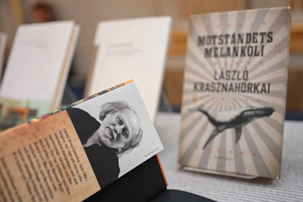 Books of Hungarian writer Laszlo Krasznahorkai, the winner of the 2025 Nobel Prize in Literature, are on display at the Swedish Academy in Stockholm, Sweden, on October 9, 2025. (Photo by Jonathan Nackstrand / AFP)