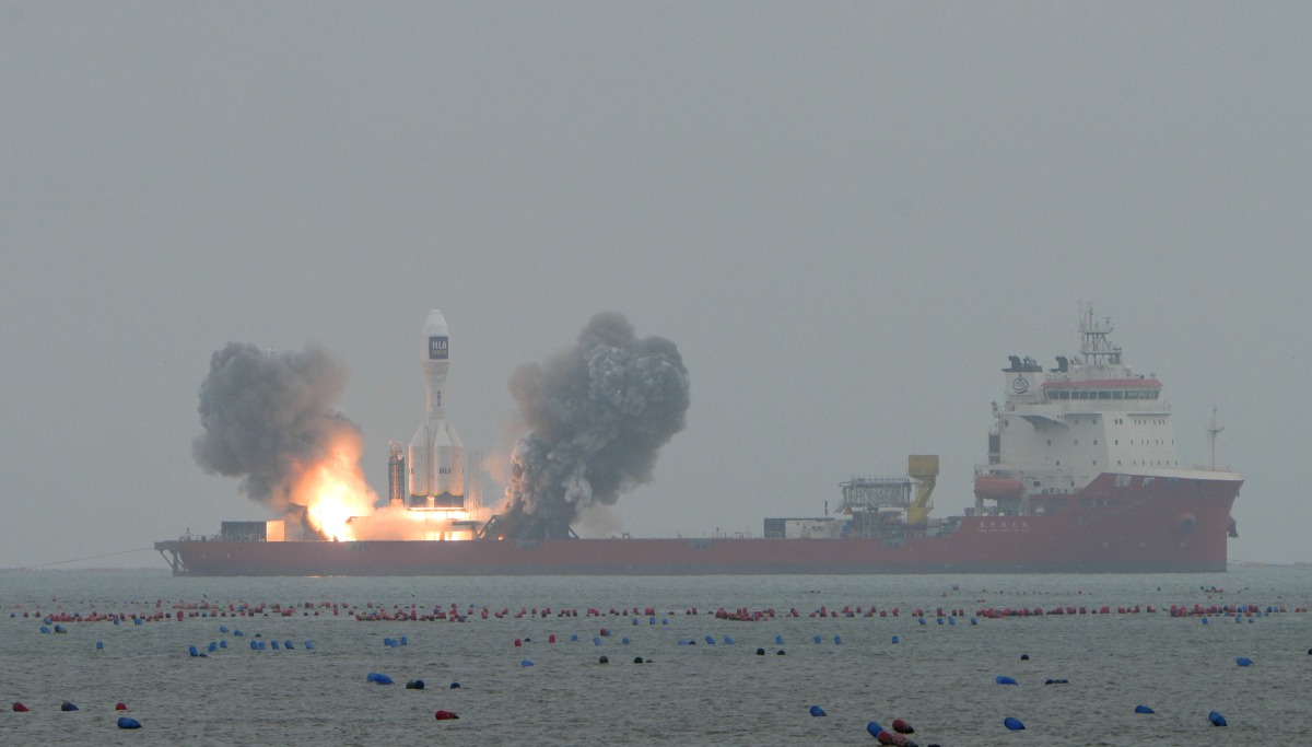 A Gravity-1 carrier rocket carrying a wide-field satellite and two experimental satellites blasts off from waters off the coast of Haiyang, east China's Shandong Province, Oct. 11, 2025. (Photo by Guo Jinqi/Xinhua)

