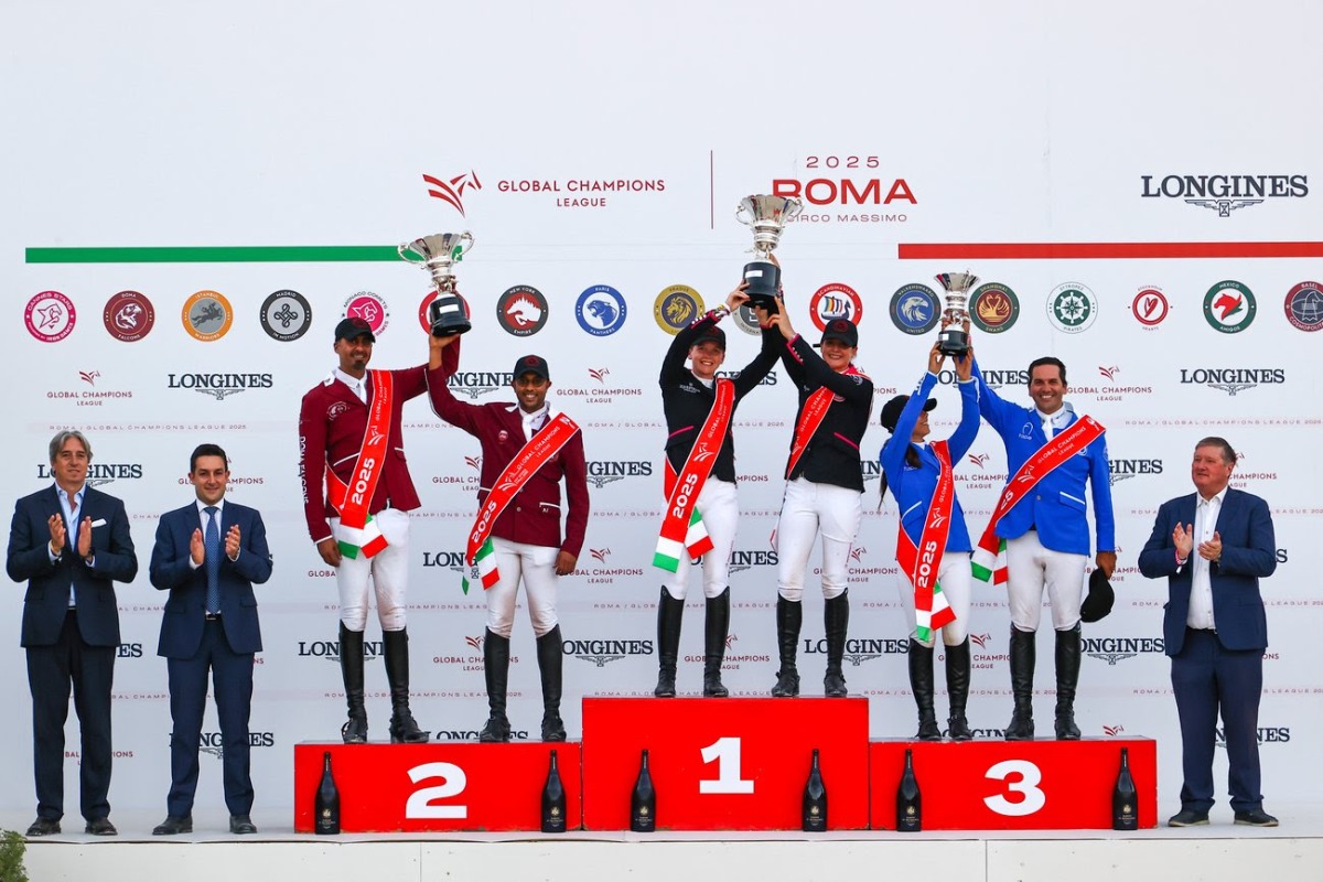 Sheikh Ali Al Khalid Al Thani and Bassem Mohammed of Doha Falcons (left) celebrate on the podium with riders of Cannes Stars and The Paris Panthers.