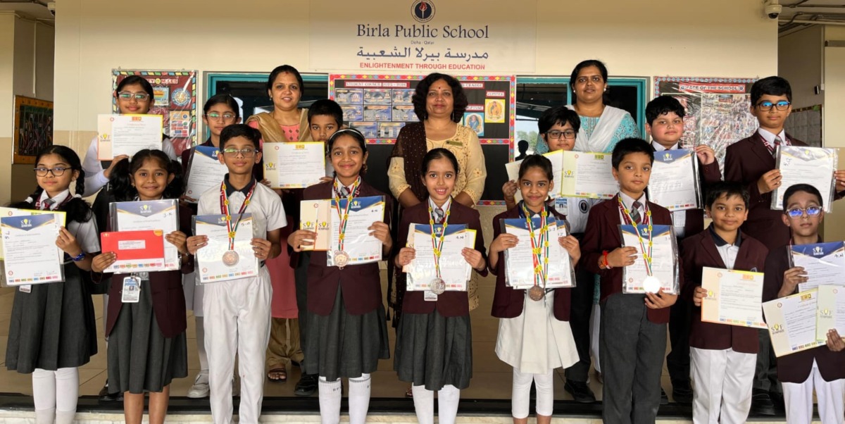 Medal winners with BPS teachers.