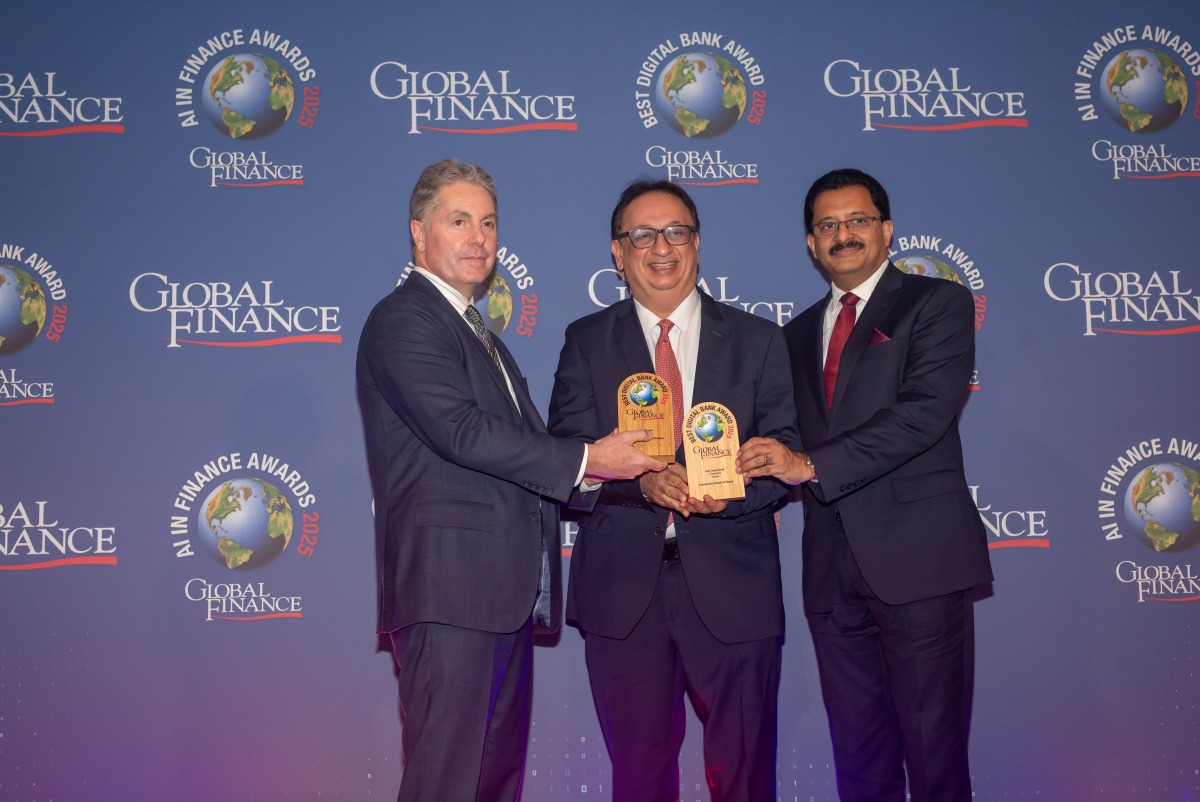 A Commercial Bank official receiving the awards during the event.