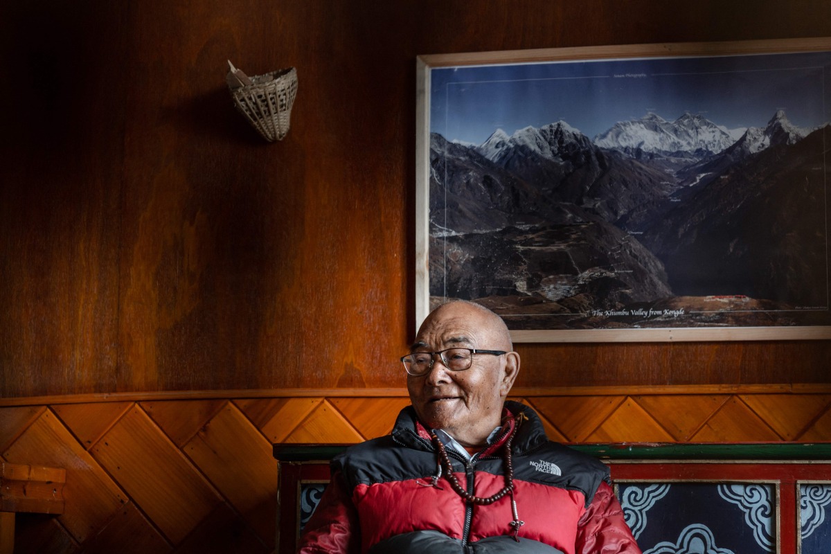 In this picture taken on May 28, 2023, Kancha Sherpa, a team member of the 1953 Mount Everest expedition which placed Tenzing Norgay and Edmund Hillary on the summit of the world's highest mountain, looks on during an interview on the eve of International Everest Day, at Namche Bazar in Solukhumbu district, northeast of Kathmandu. Photo by ROBIC UPADHAYAY / AFP