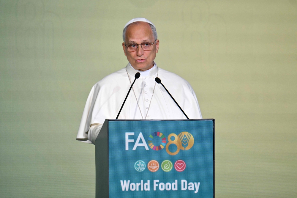 Pope Leo XIV delivers a speech during the World Food Day event in Rome on October 16, 2025. (Photo by Alberto Pizzoli / AFP)