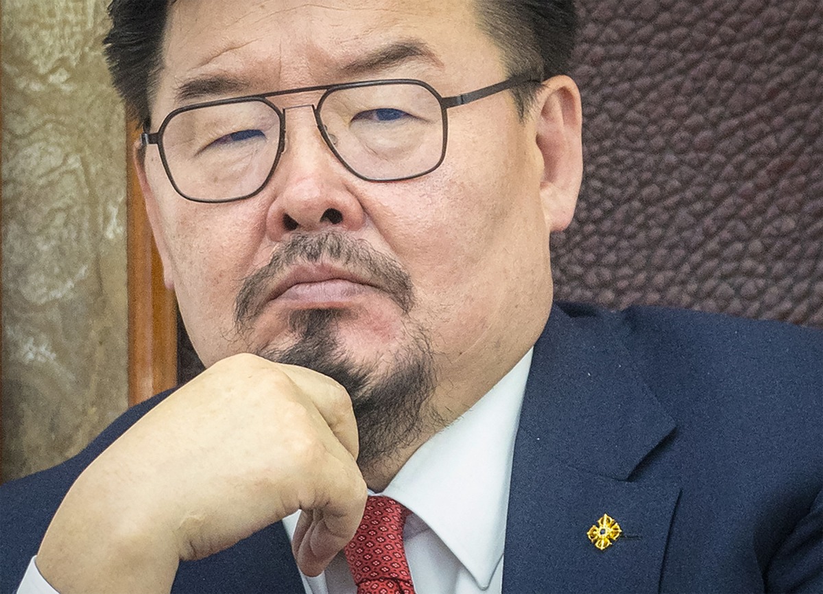 Mongolian Prime Minister Gombojav Zandanshatar looks on as he attends a vote on his dismissal during a plenary session at the parliament in Ulaanbaatar on October 17, 2025. Photo by Byambasuren BYAMBA-OCHIR / AFP