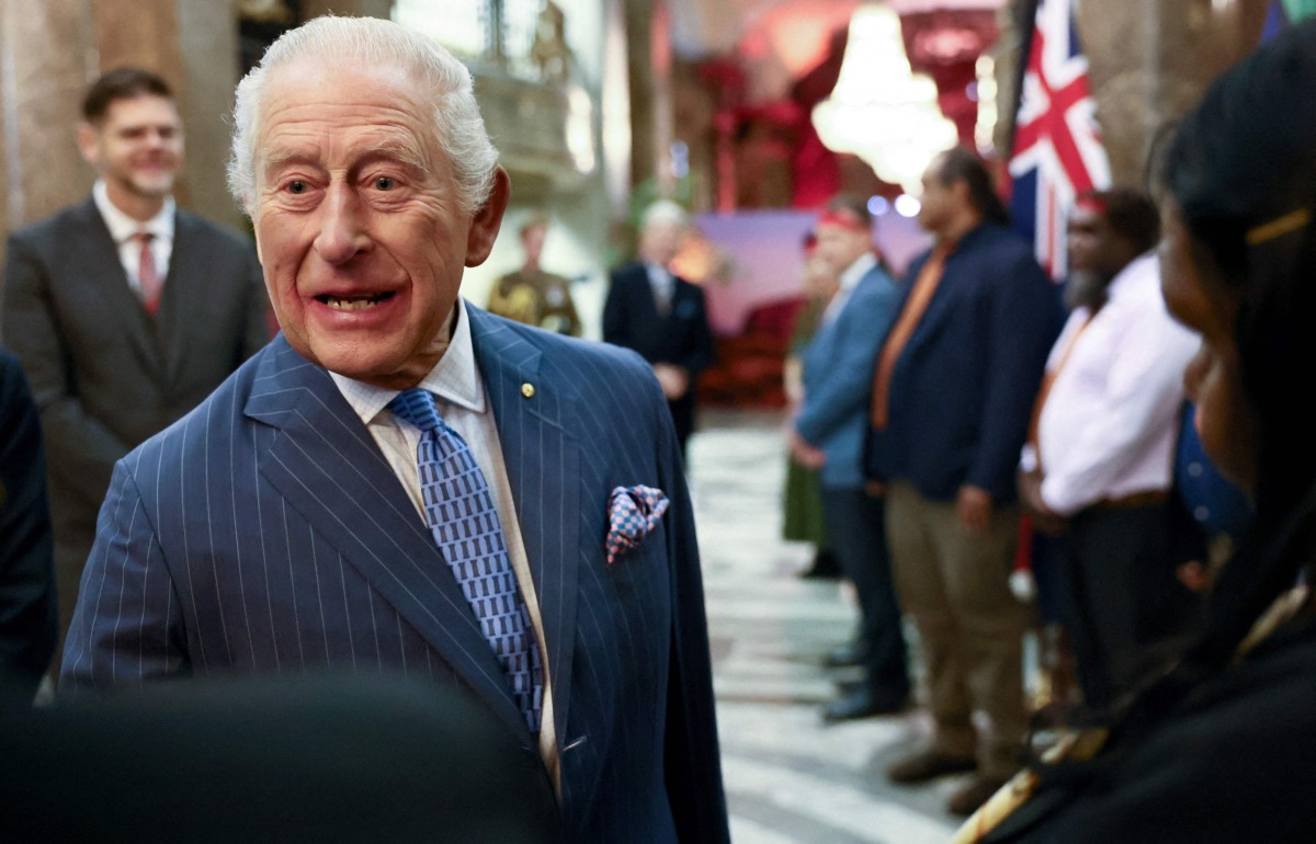 Britain's King Charles III meets Anangu Traditional Owners at the Australian High Commission in London on October 16, 2025, for a celebration to commemorate the 40th Anniversary of the hand-back of Uluru-Kata Tjuta. (Photo by Jack Taylor / POOL / AFP)