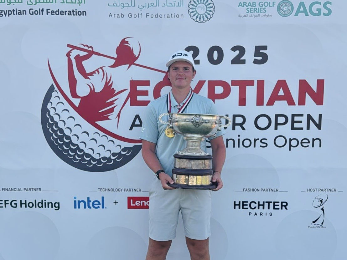 Daniil Sokolov celebrates with the trophy.