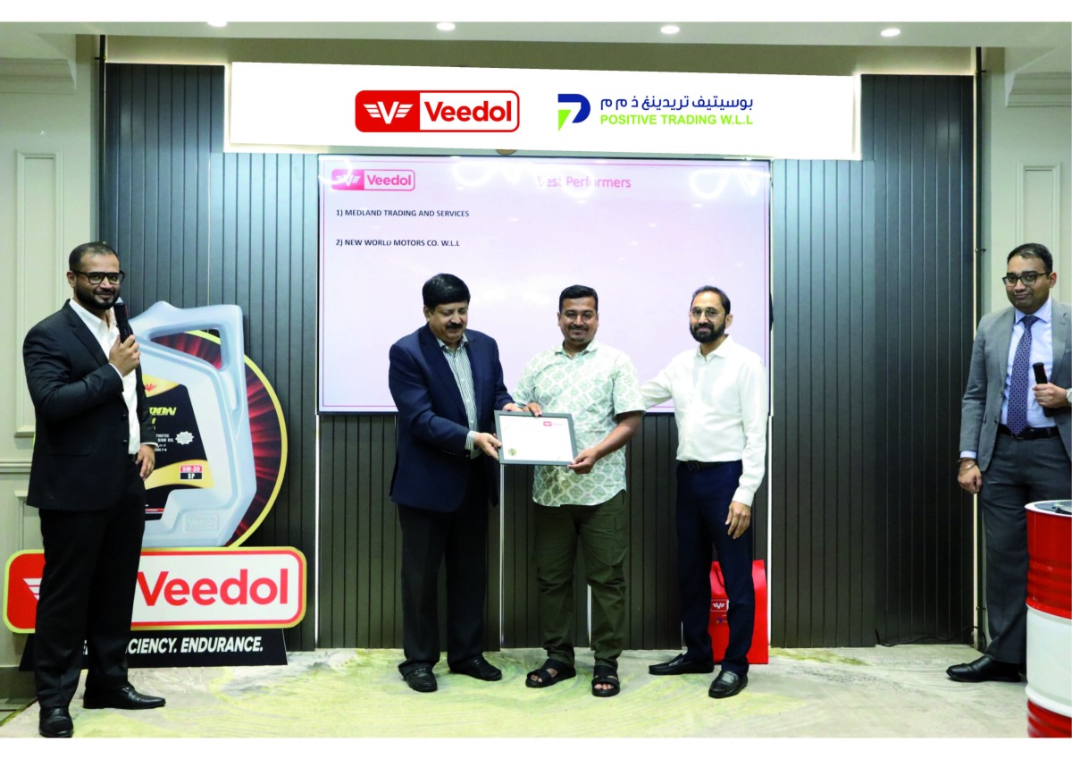 Veedol International and Positive Trading officials during the meeting.