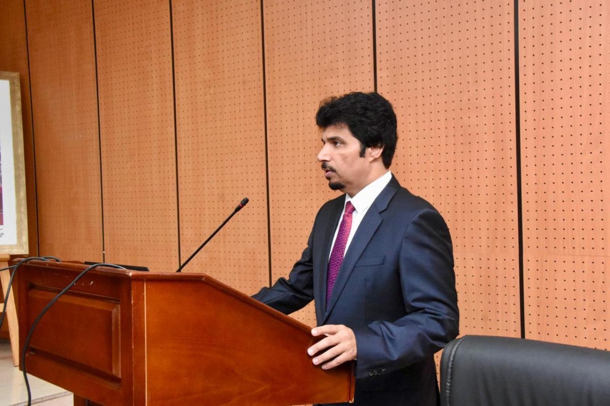 Dr. Safar Mubarak Al-Shafi defending his doctoral dissertation.