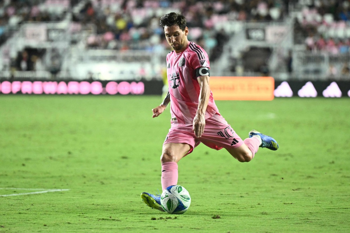 (FILES) Inter Miami's Argentine forward #10 Lionel Messi kicks the ball during the Major League Soccer (MLS) regular season football match between Inter Miami CF and Chicago Fire FC at Chase Stadium in Fort Lauderdale, Florida, on September 30, 2025. (Photo by CHANDAN KHANNA / AFP)