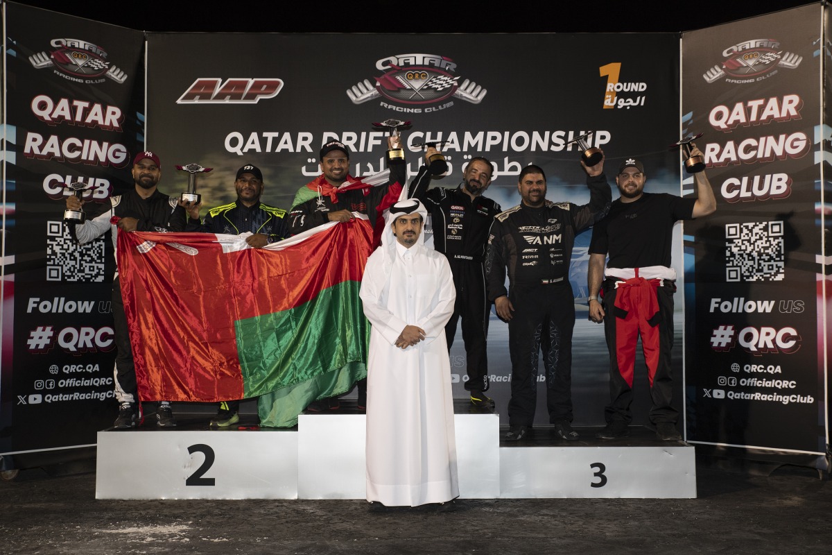 QRC General Manager Sheikh Jabor bin Khalid poses for a photo with the podium winners.