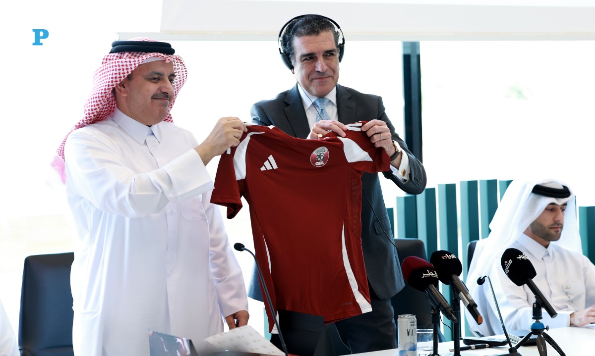 Executive Director of Earthna, Dr. Gonzalo Castro de la Mata, and QRCS Assistant Secretary-General for Communication and Resource Development, Mohamed Al Beshri, display the first jersey donated by the Qatar National Football Team to the “1 Million Jerseys for Gaza” campaign.  Pic: Rajan Vadakkemuriyil/The Peninsula.
