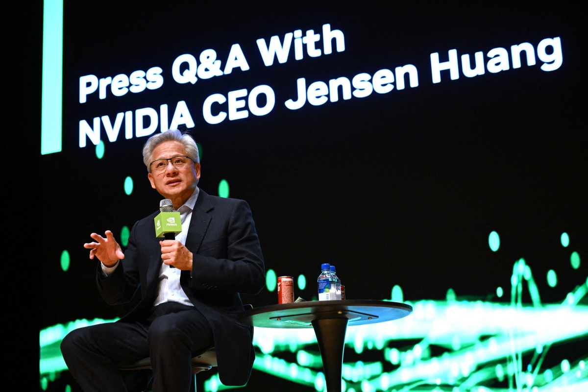 Nvidia founder and CEO Jensen Huang speaks during a press conference at the Asia-Pacific Economic Cooperation (APEC) CEO Summit in Gyeongju on October 31, 2025. (Photo by Jung Yeon-je / AFP)
