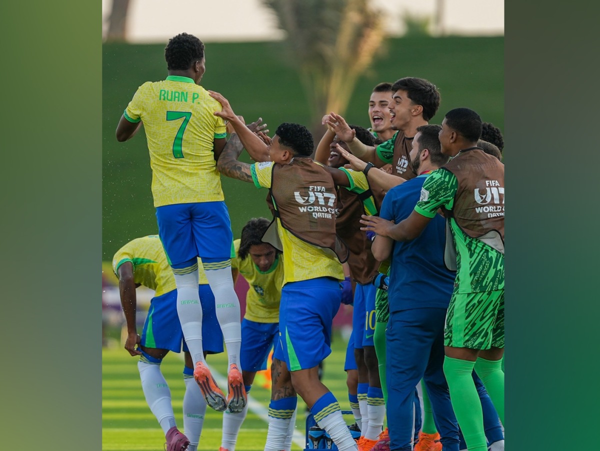 Brazil players celebrate.
