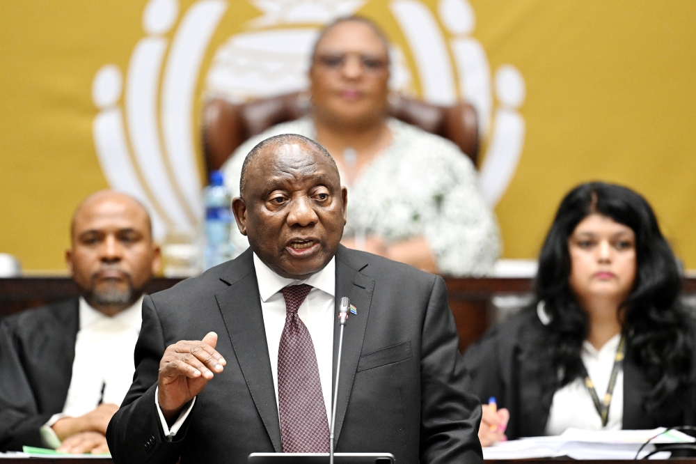 South African President Cyril Ramaphosa speaks during a question-and-answer session in the National Assembly in Cape Town, South Africa. Photo by Xabiso Mkhabela/Xinhua