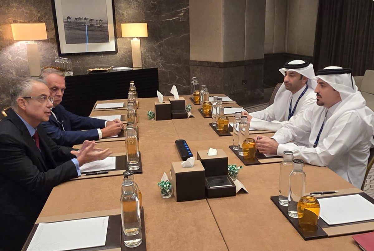 CEO of the Qatar Financial Markets Authority, Dr. Tamy bin Ahmad Al Binali, along with other officials.