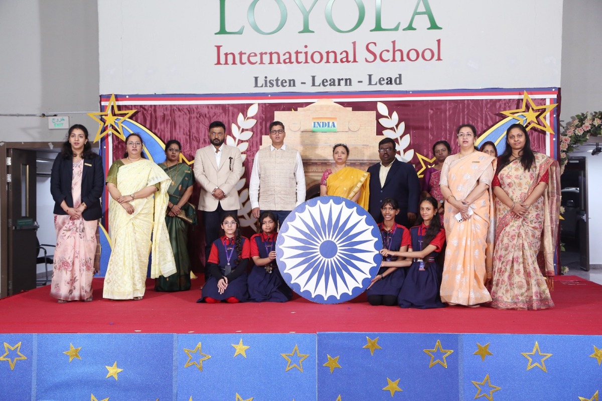 School principal and guests with the winning students and teachers.  