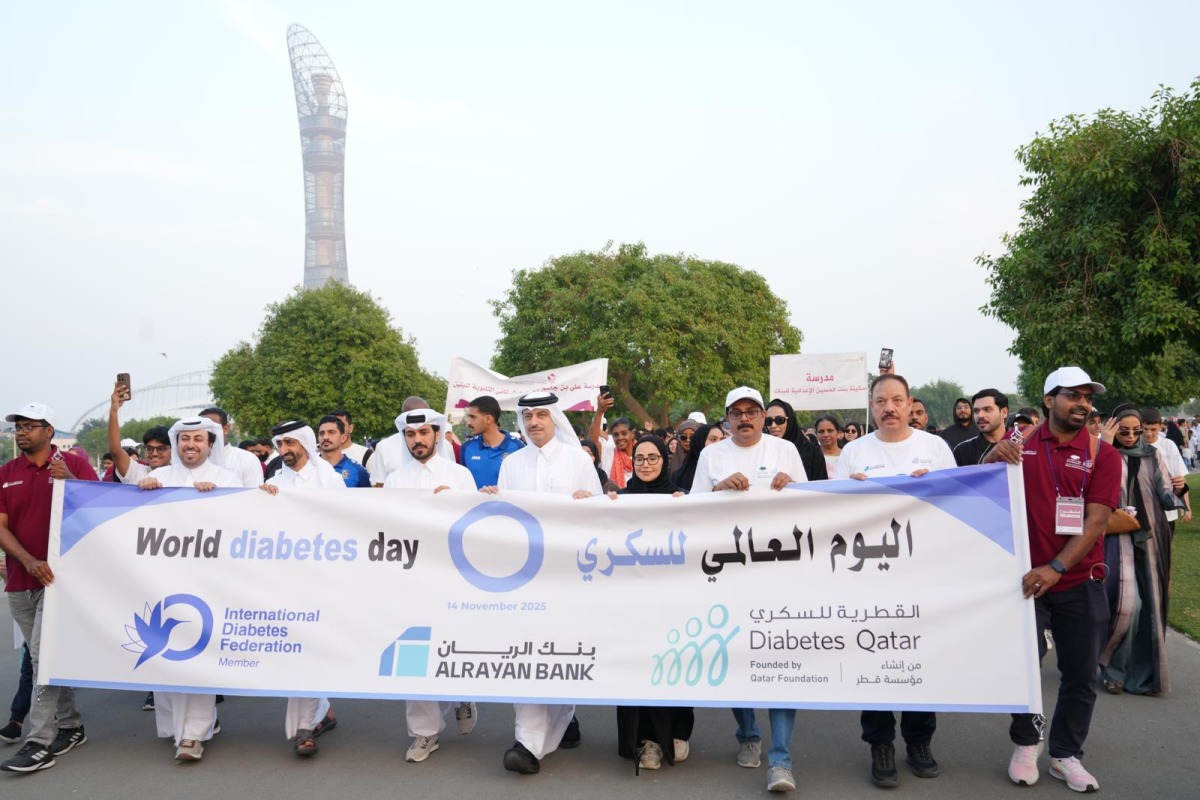 Representatives and participants walking around Aspire park to mark World Diabetes Day.
