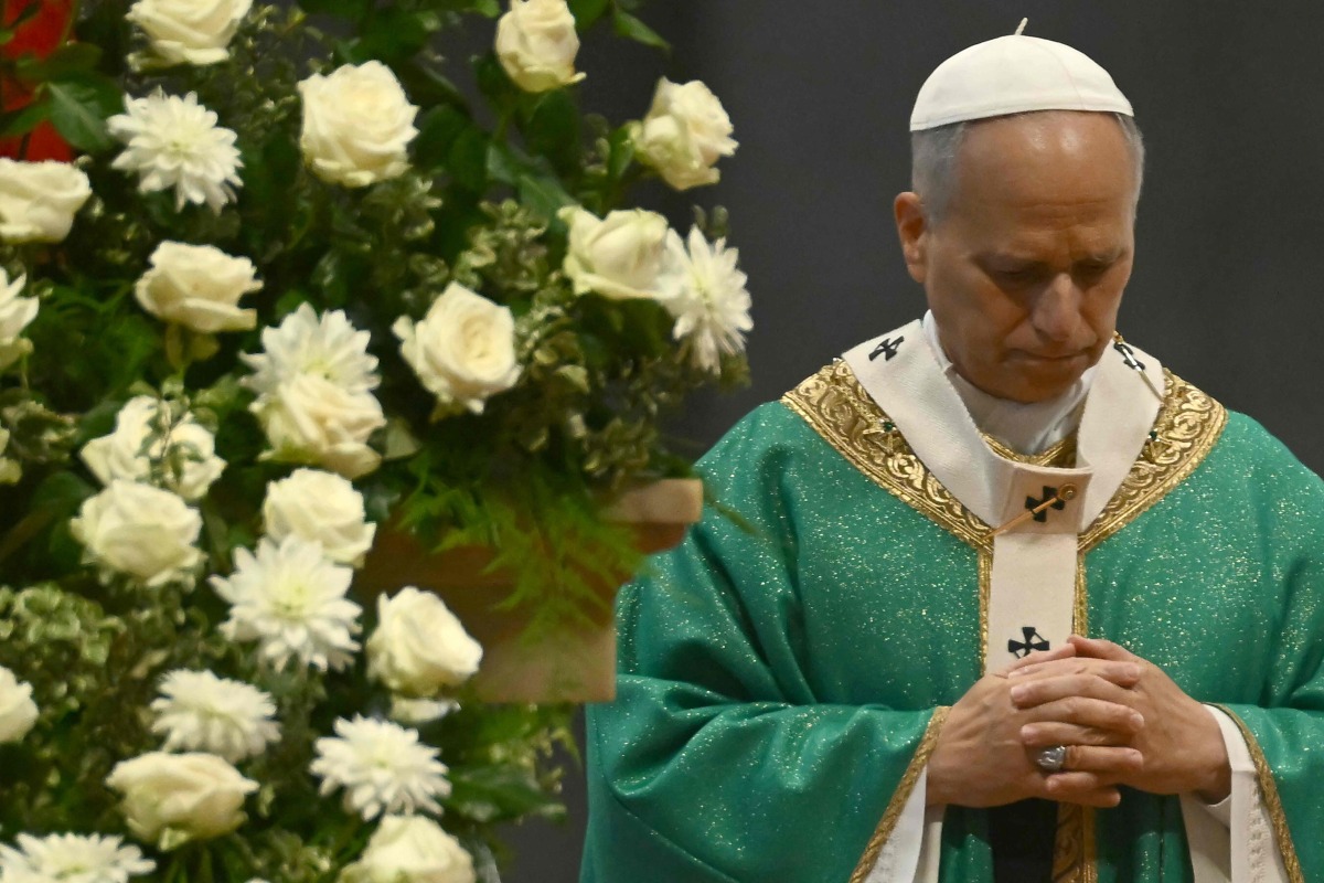 Pope Leo XIV leads a mass for the Jubilee of the poor at St Peter's basilica in The Vatican, on November 16, 2025. (Photo by Filippo MONTEFORTE / AFP)