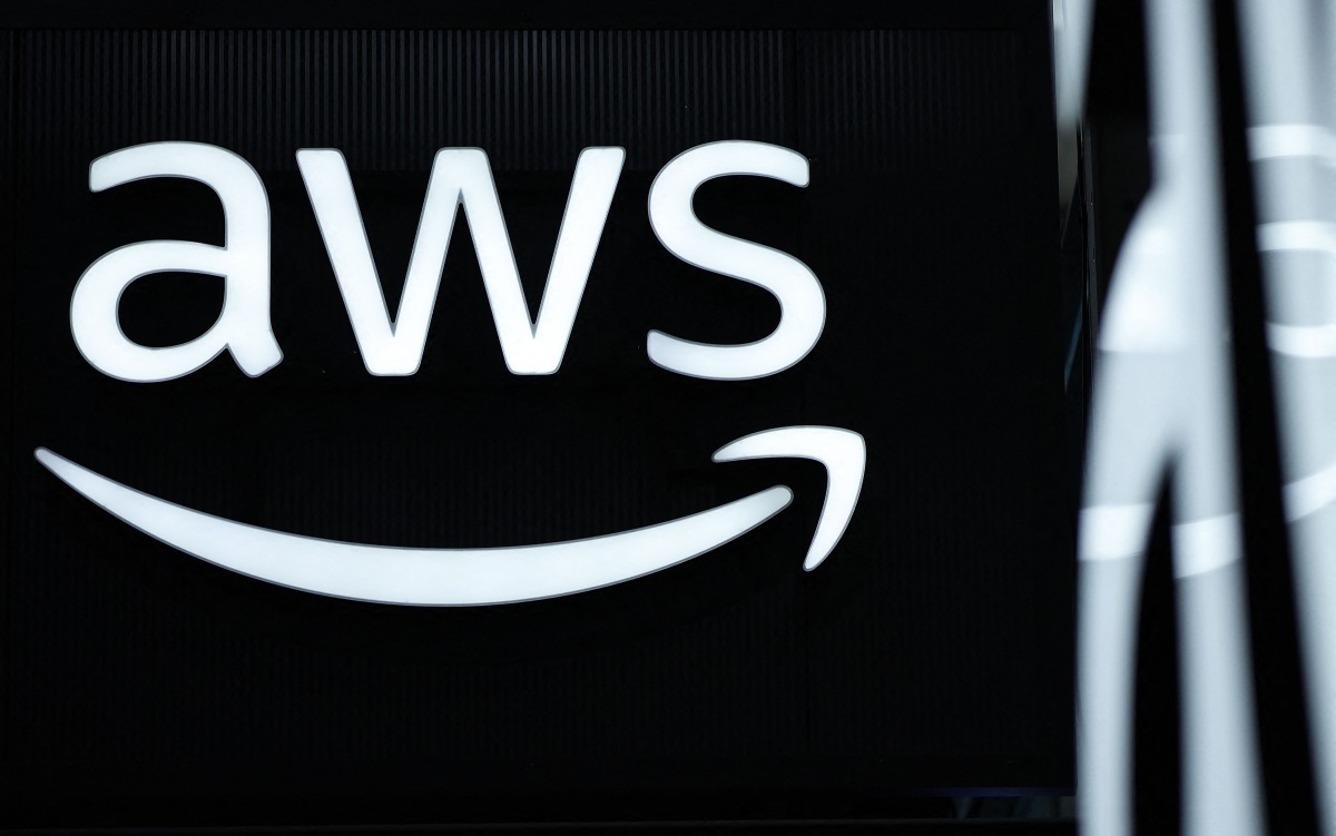 The logo of Amazon Web Services (AWS) is seen during the opening of the Hannover Messe industrial trade fair for mechanical and electrical engineering and digital industries, on March 31, 2025 in Hanover, northern Germany. Photo by RONNY HARTMANN / AFP