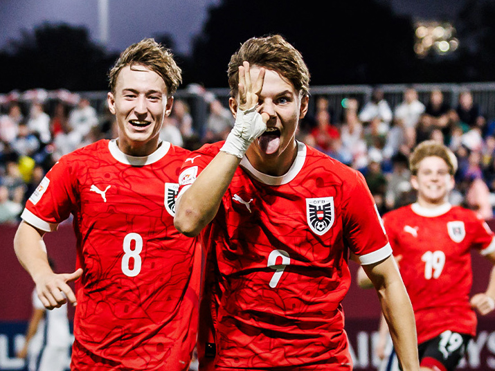 Austria's Hasan Deshishku (right) celebrates after scoring a goal. PIC: OEFB