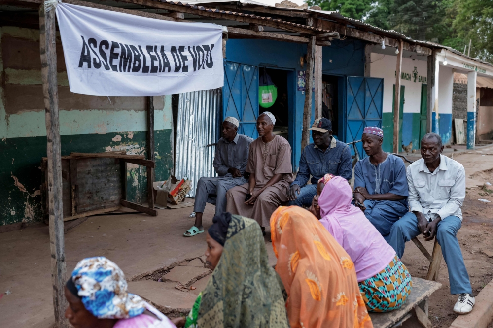Voters queue outside a polling station before polls open at the Gabu Maternal and Child Center polling station in Gabu on November 23, 2025 during Guinea-Bissau's presidential and legislative elections. Photo by Patrick Meinhardt / AFP
