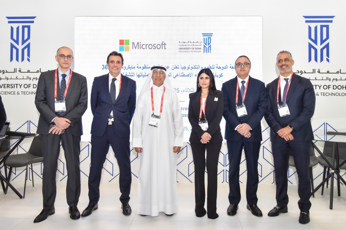 UDST President Dr. Salem Al-Naemi with Microsoft Qatar and university officials.