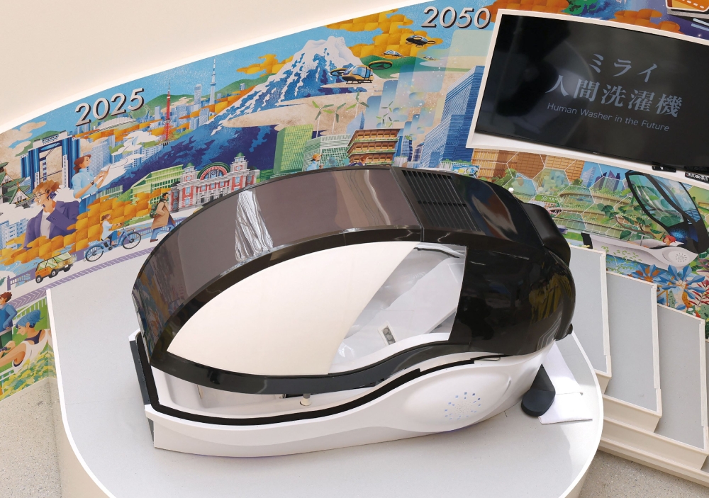 This photo taken on April 9, 2025 shows the Mirai Human Washing Machine, which attracted attention at the Osaka Expo. (Photo by JIJI Press / AFP) 