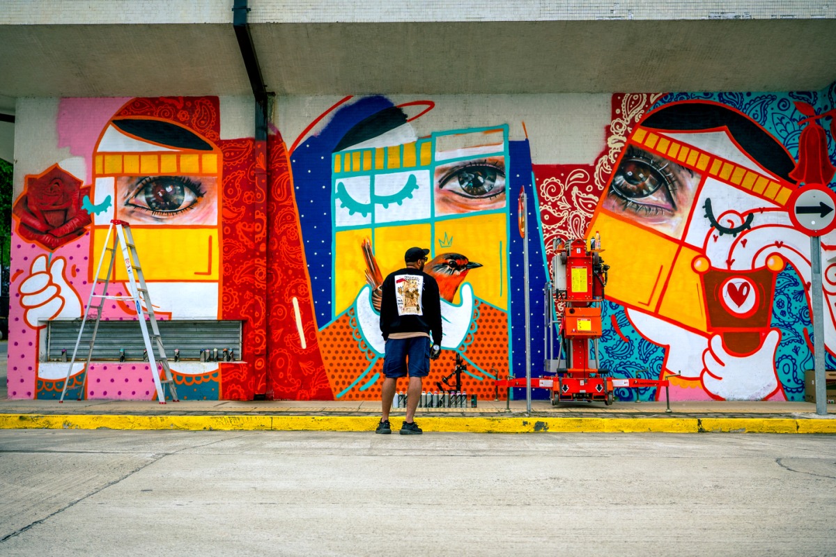 Mural by Mubarak Al Malik.