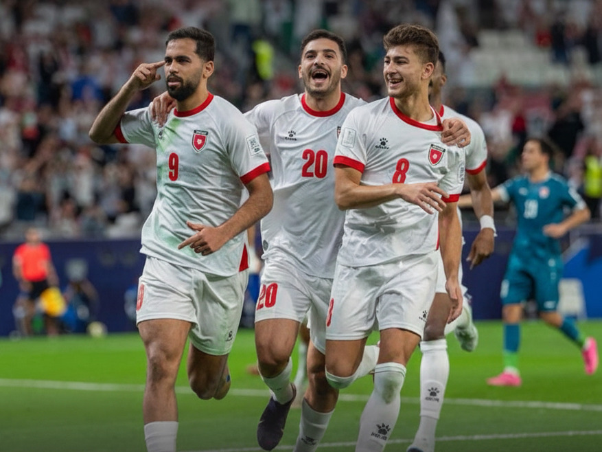 Jordan's Ali Olwan (left) celebrates with teammates.