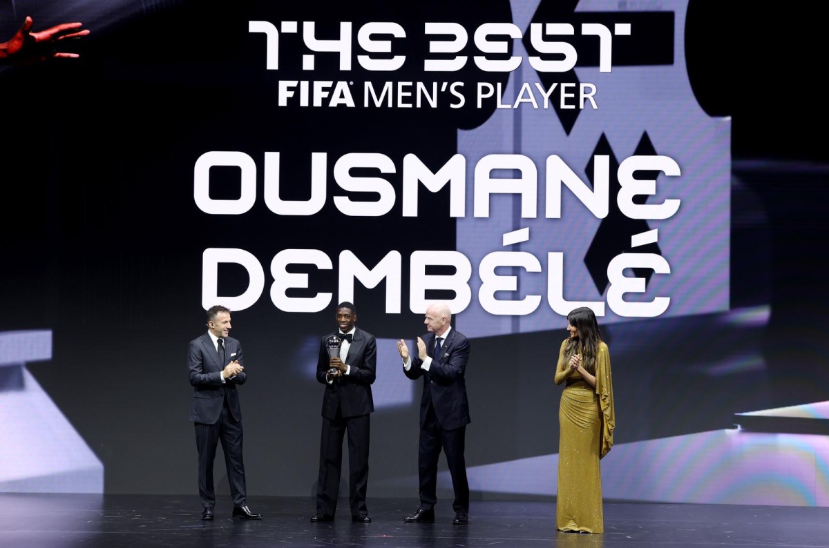 The Best FIFA Men's Player winner, Ousmane Dembele (second left) on stage with FIFA President Gianni Infantino (third left) and former footballer Alessandro Del Piero (left).