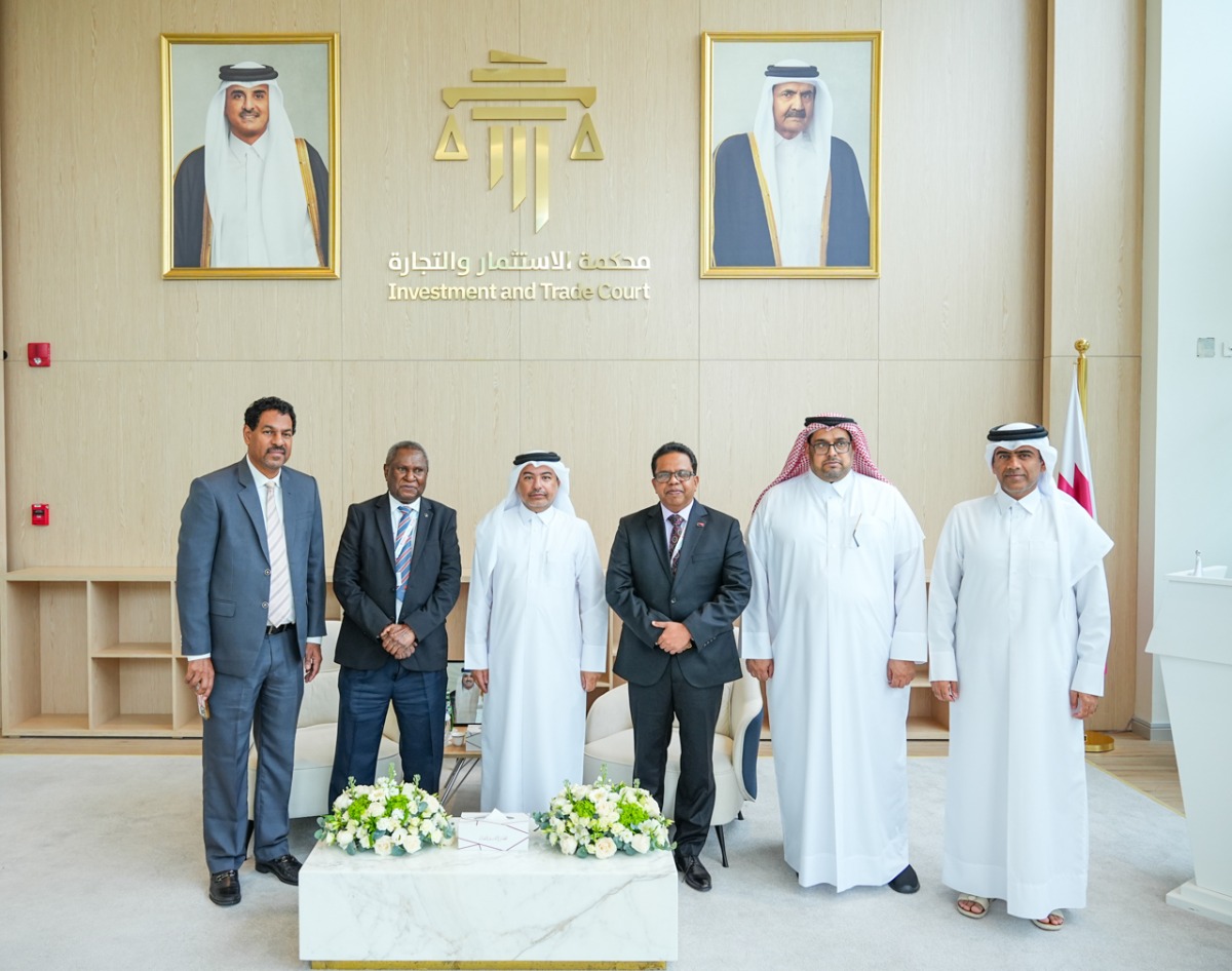 President of the Investment and Trade Court, Judge Khalid bin Ali Al Obaidly and Chief Justice of Republic of Papua New Guinea Sir Gibbs Gibuma Salika with other officials during the meeting.
