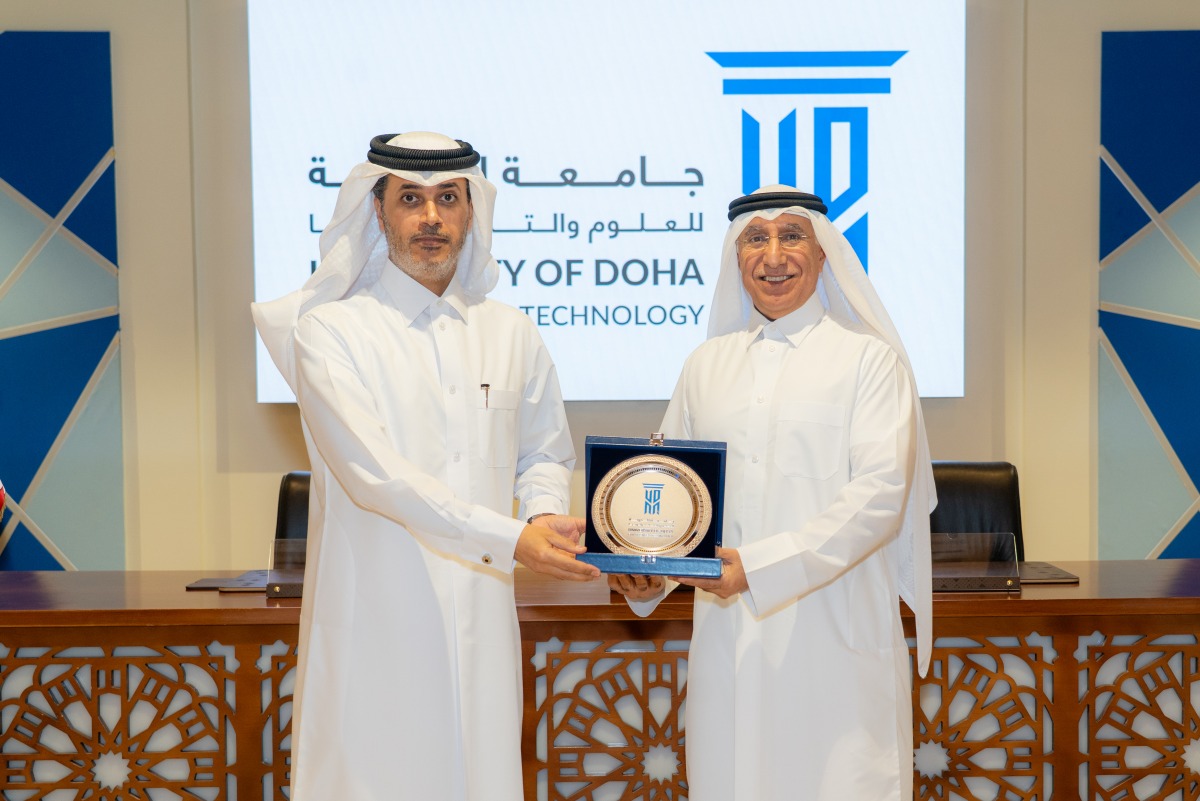 UDST President Dr. Salem Al-Naemi honouring Editor-in-Chief of The Peninsula Prof. Khalid Mubarak Al-Shafi at a ceremony held recently.