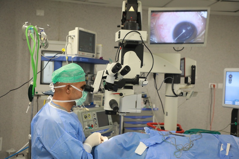 An eye surgeon performing surgery in an operating room in Gaza.