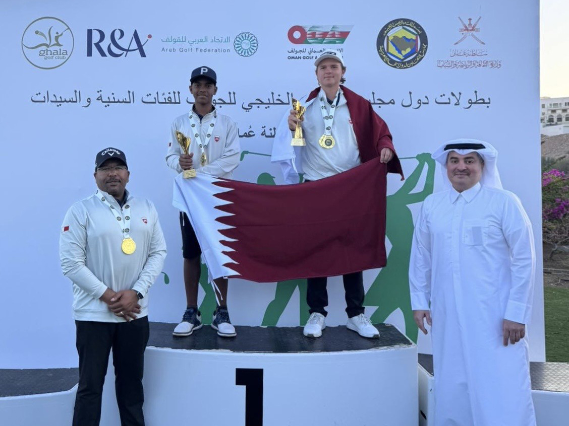 Qatar players celebrate on the podium after winning the U-16 team and individual titles at the Gulf Golf Championship in Oman.