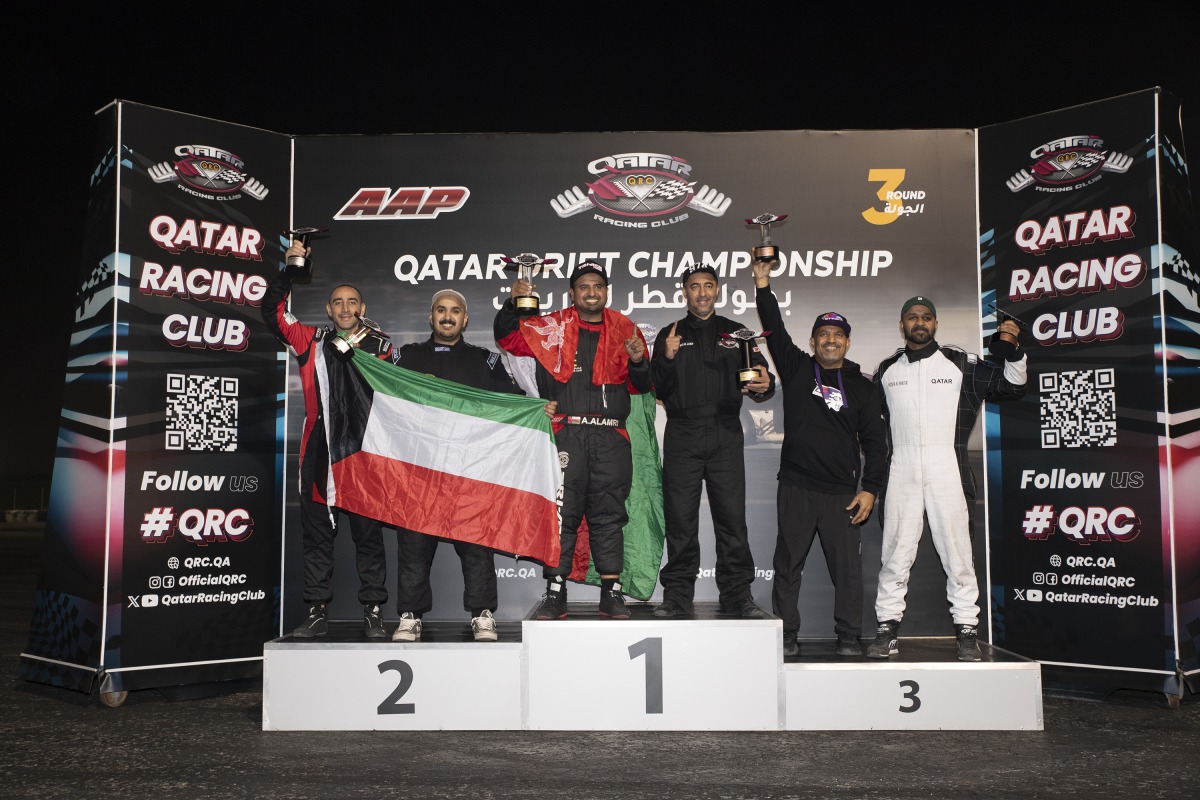 Podium winners celebrate after the third round of Qatar Drift Championship.