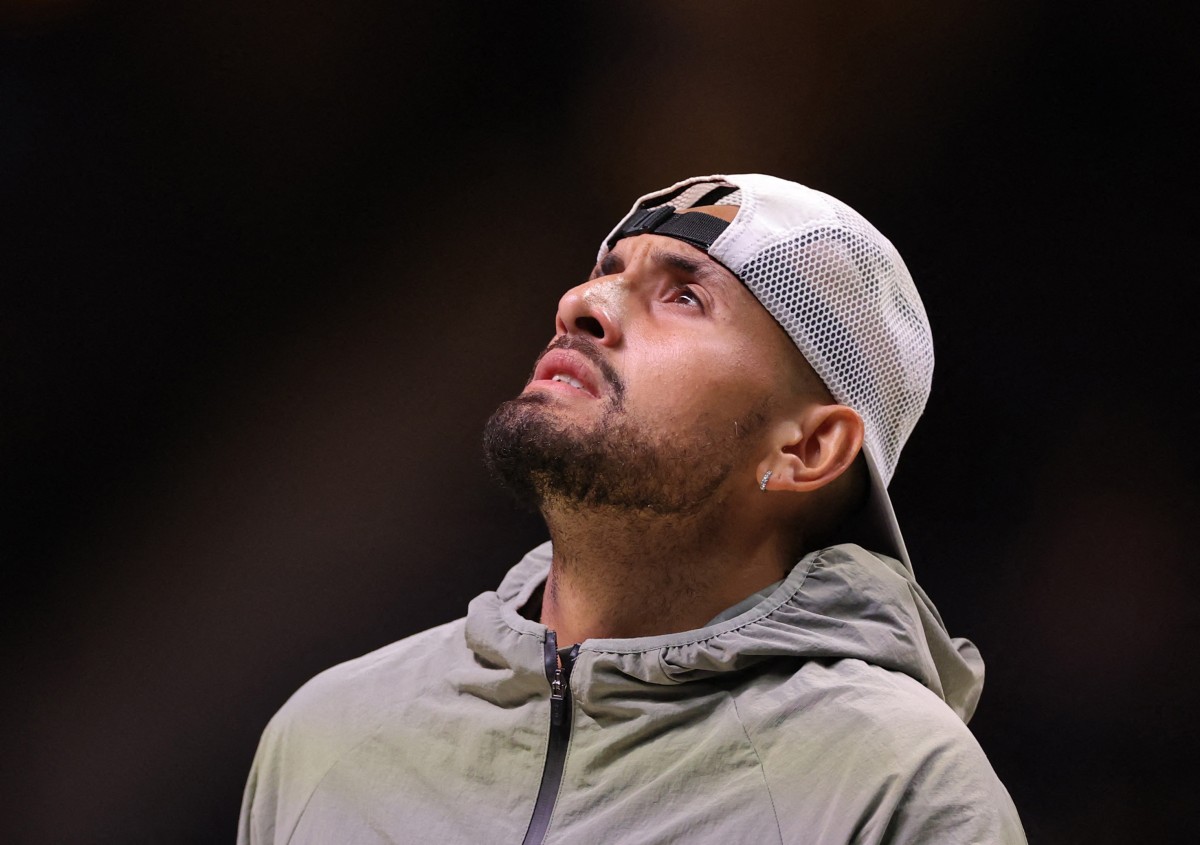 Australia's Nick Kyrgios reacts after winning his tennis match against Belarus’ Aryna Sabalenka in Dubai on December 28, 2025. Photo by Amr Alfiky / POOL / AFP
