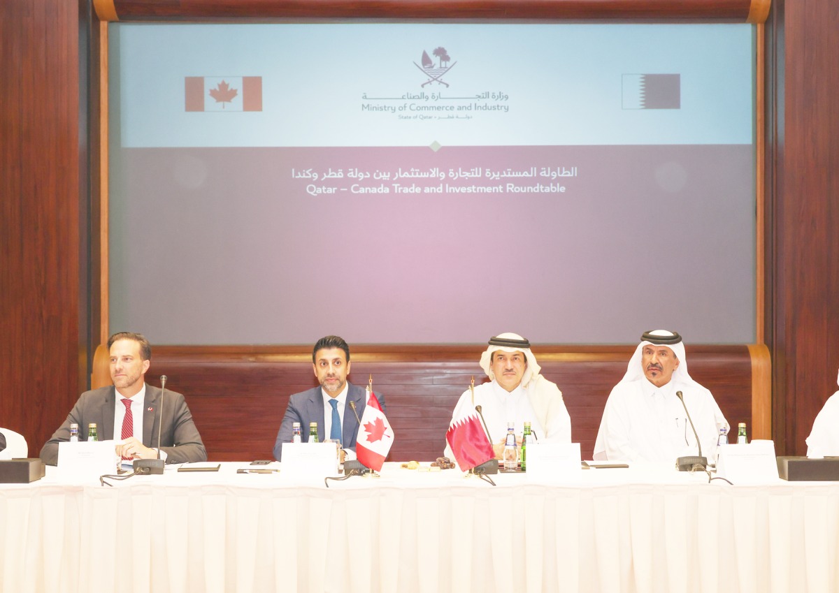 Minister of State for Foreign Trade H E Dr. Ahmed bin Mohammed Al-Sayed and Minister of International Trade of Canada H E Maninder Sidhu with other officials during the meeting, yesterday.