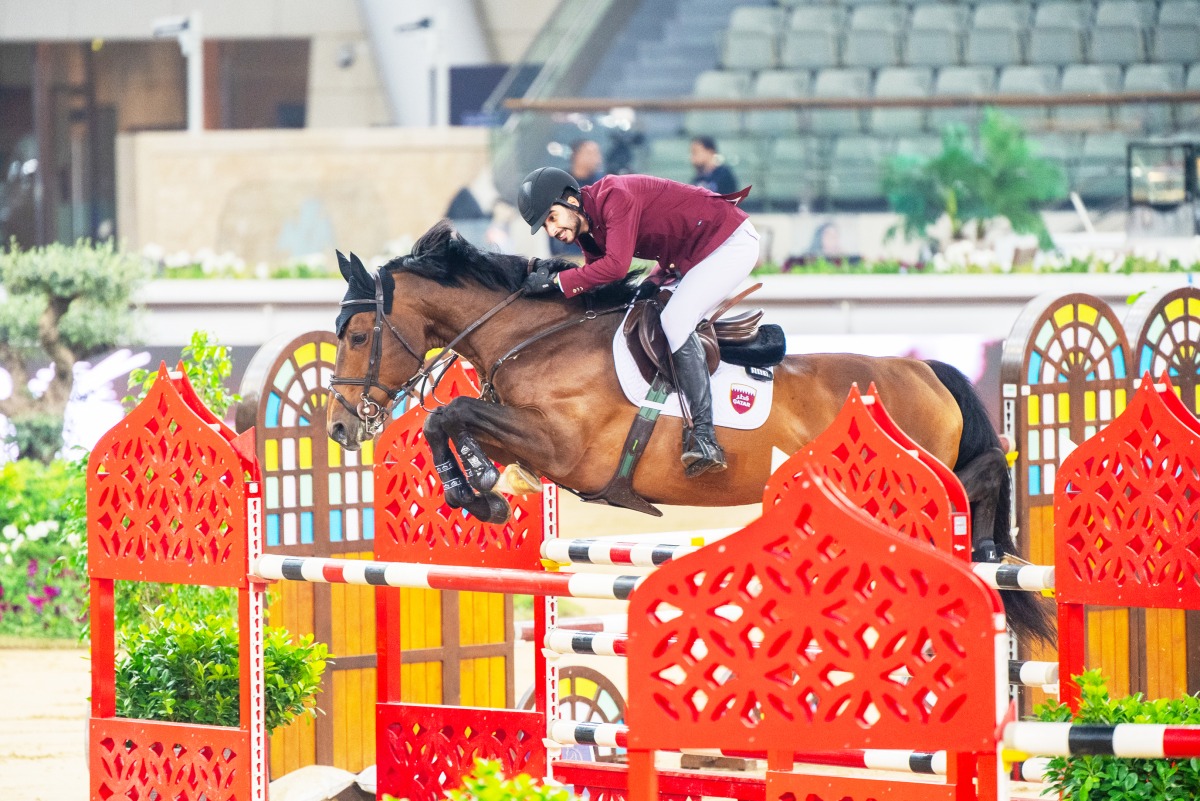 Qatar's Mohammed K. Al Baker guides Dukhan over a fence during the CSI5* – 1.40m event.