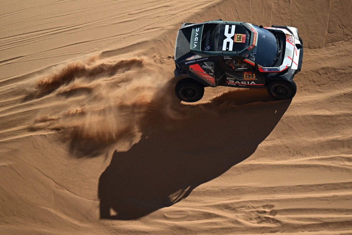 The Dacia Sandriders' Qatari driver Nasser Al Attiyah and Belgian co-driver Fabian Lurquin compete in Stage 8 of the 48th Dakar Rally. AFP